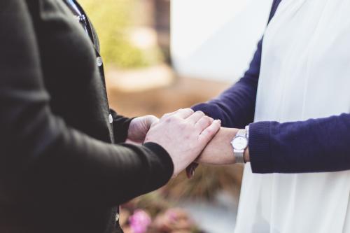 Two female hands holding