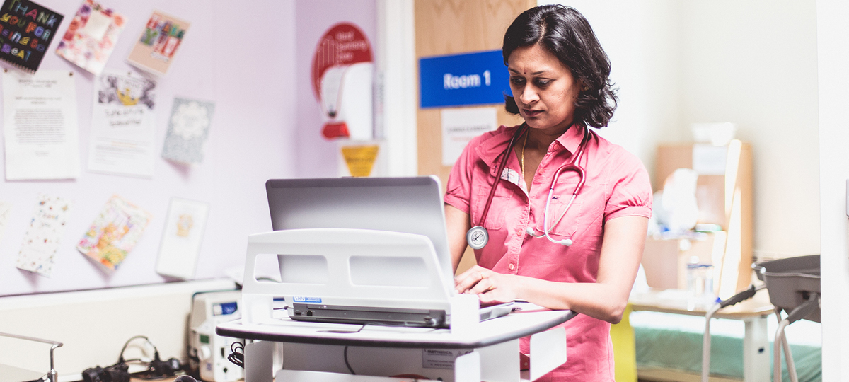 Female doctor looking at monitor