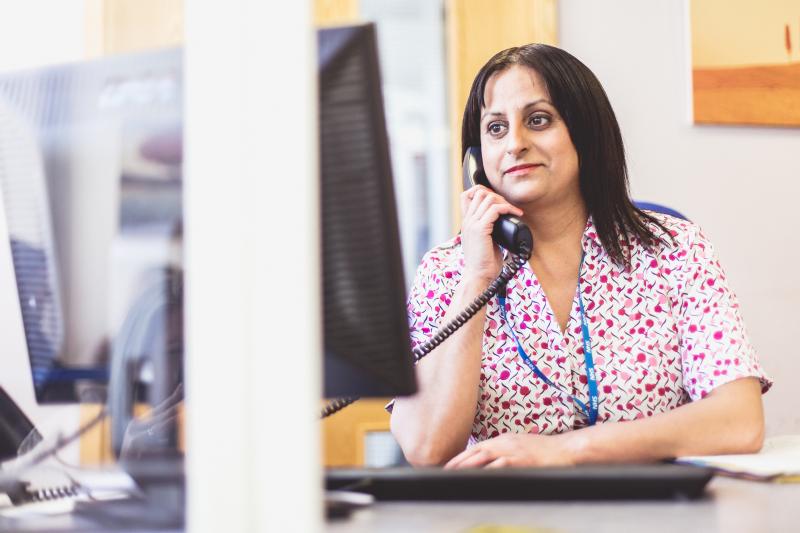 Receptionist on telephone