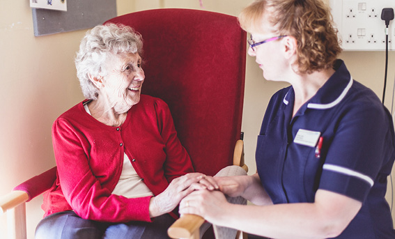 Nurse talking to patient 