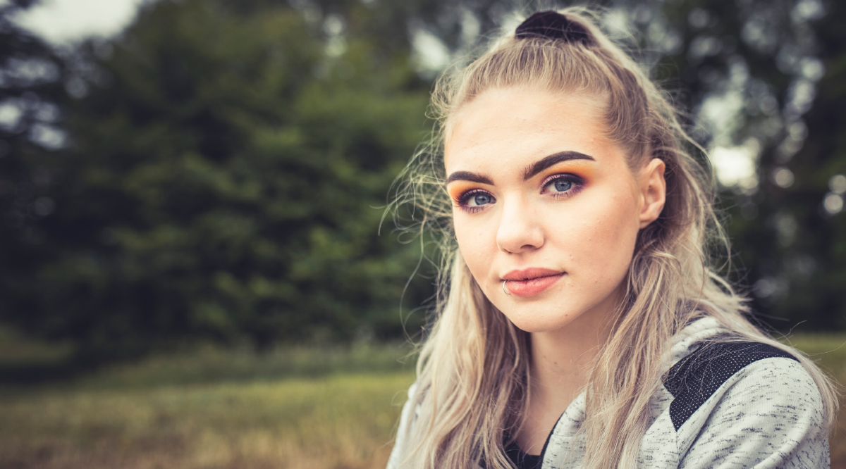 Young woman looking into camera