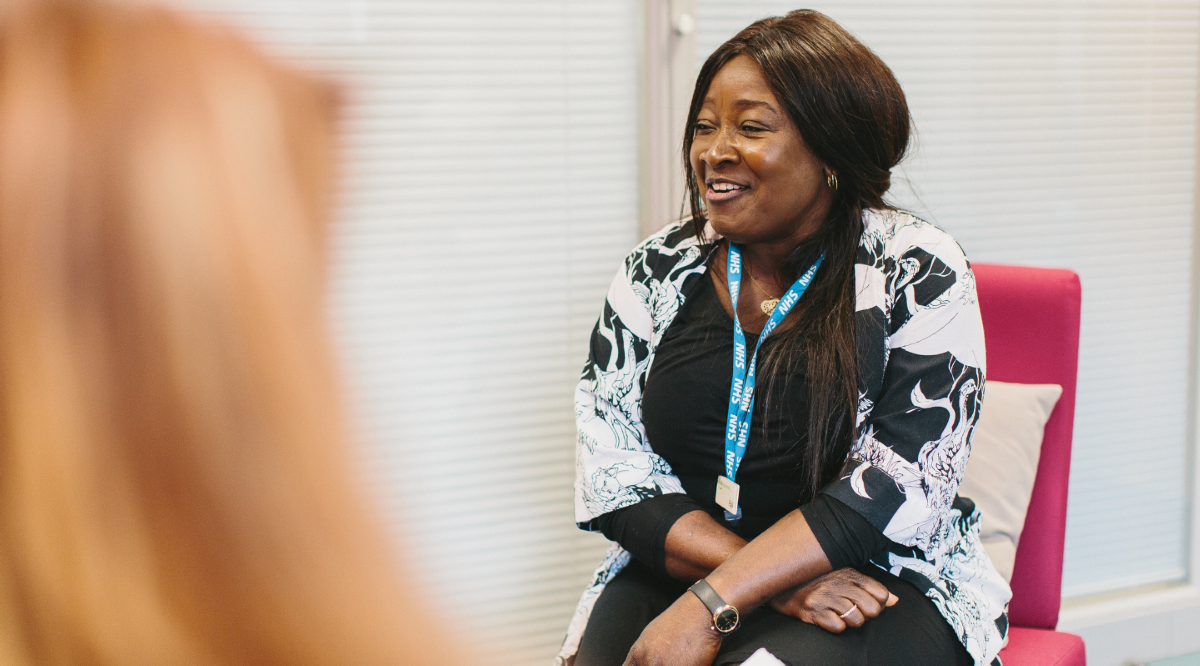 Female colleague smiling at client