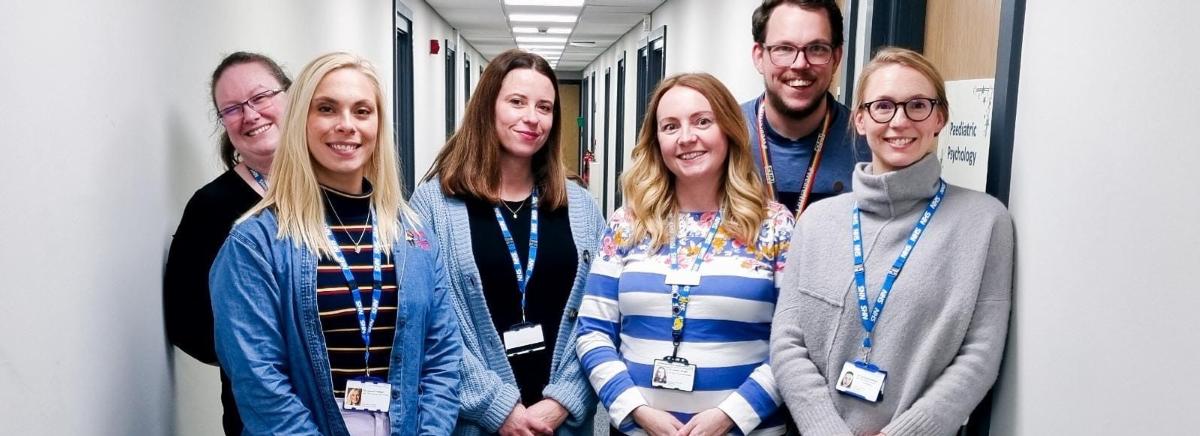 A team photo of the paediatric psychology service for their webpage header.