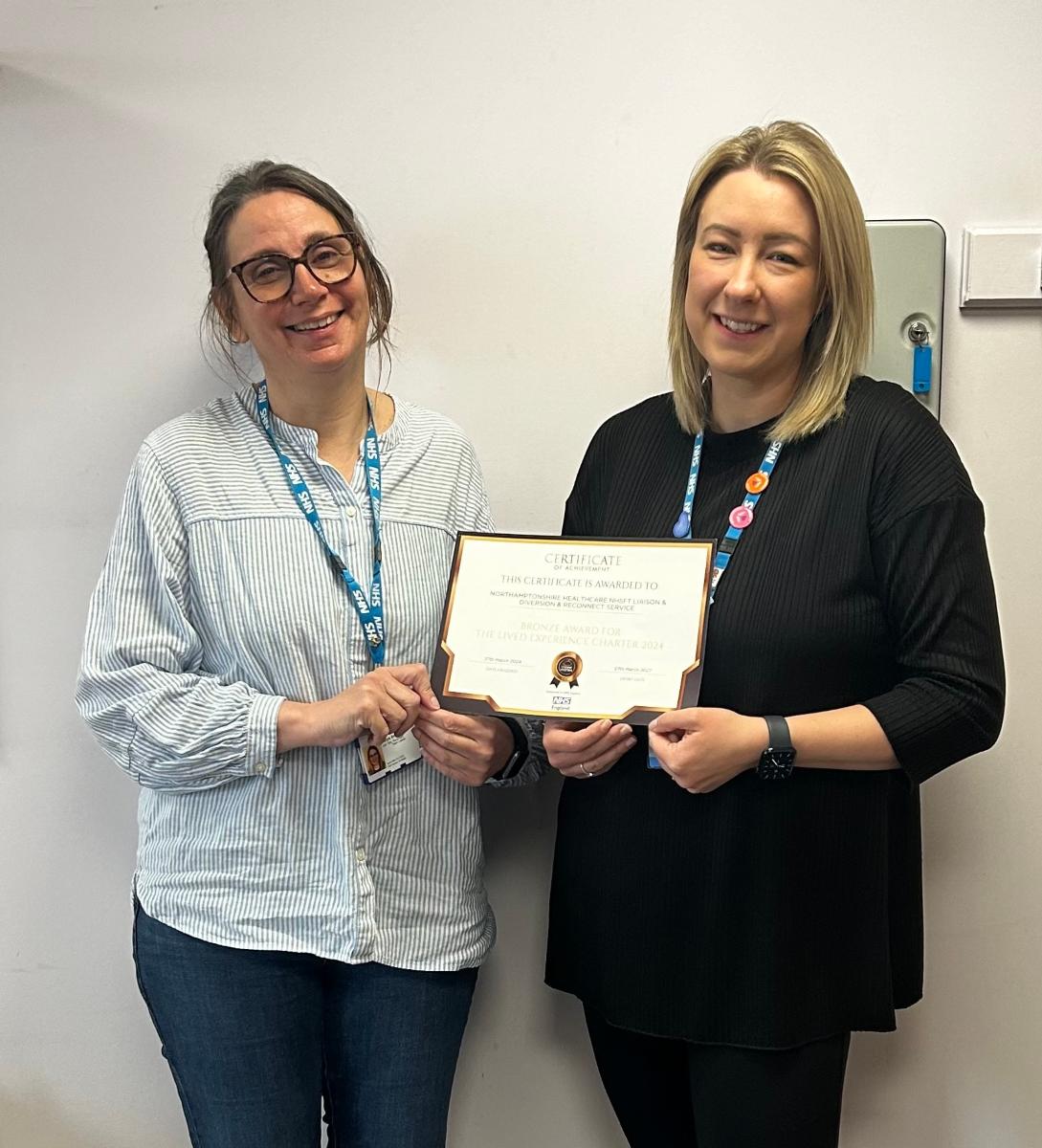 Tanya Browne Reconnect Team Leader and right Rachael Blundred Liaison and Diversion Team Leader with the certificate CROP.jpg