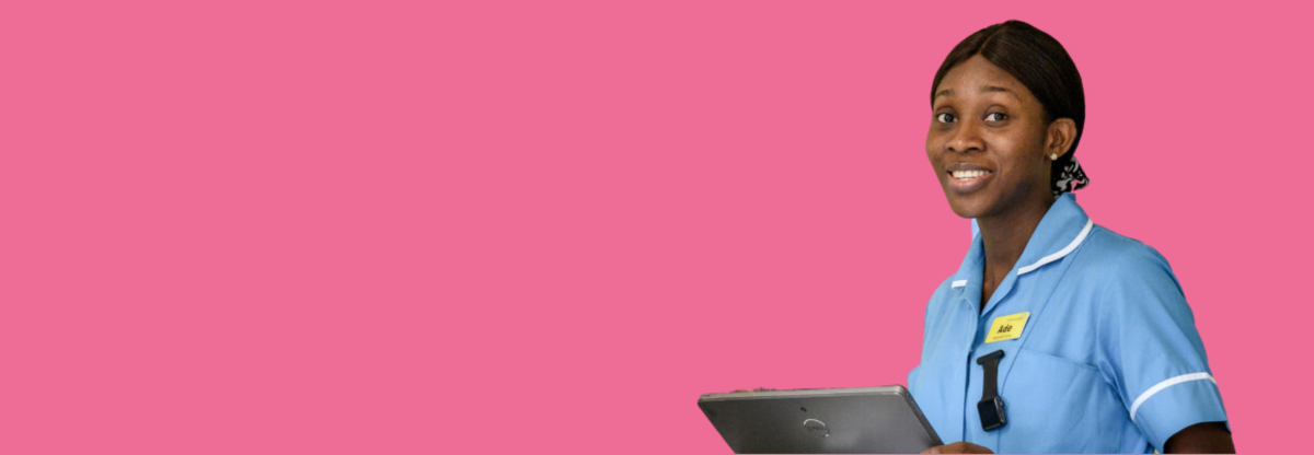 A cutout of a smiling female community hospital nurse against a pink background
