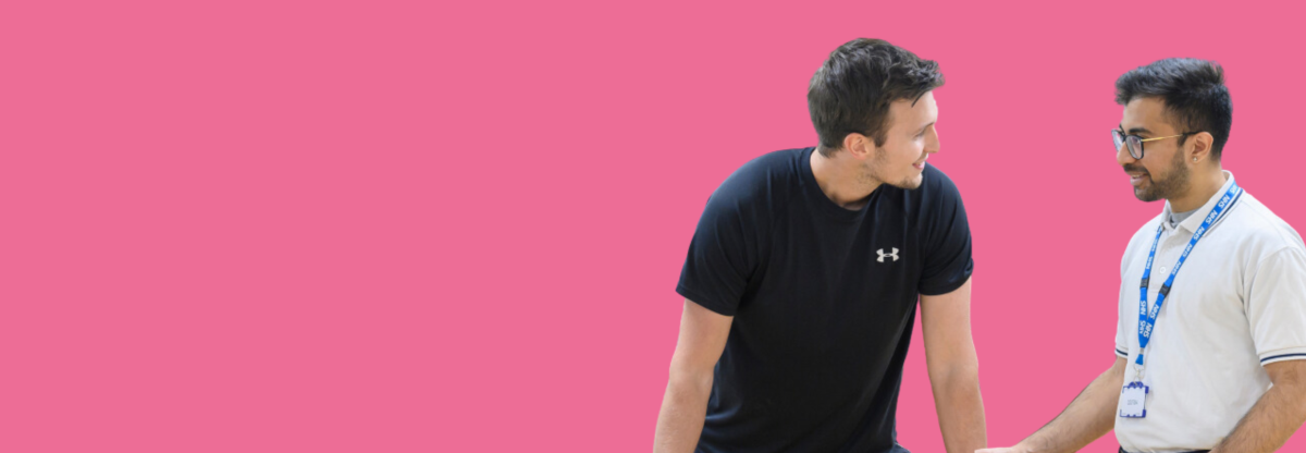 A cutout image of a physiotherapist speaking with a smiling patient against a pink background