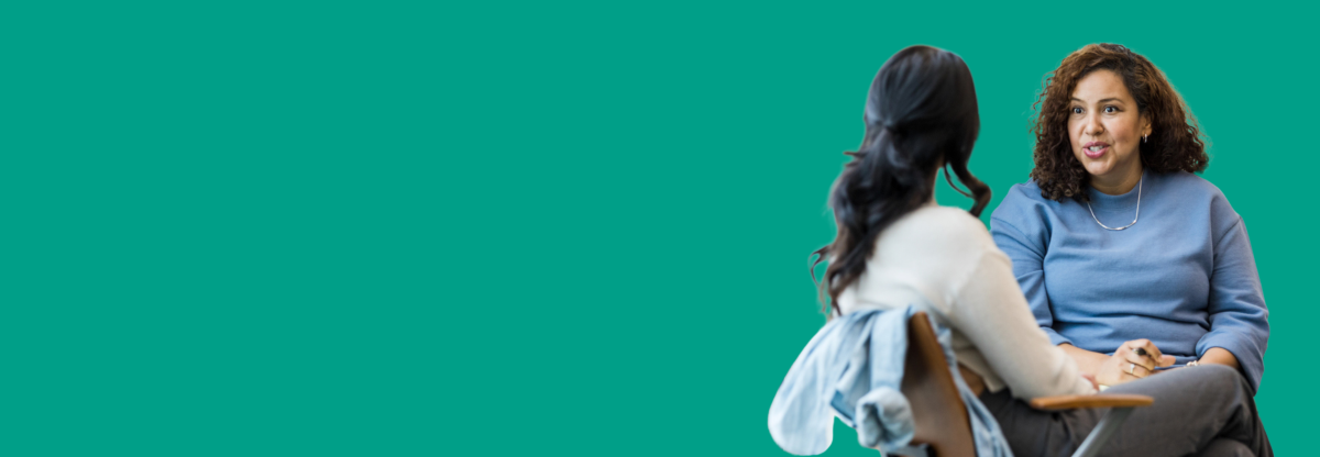A cutout image of two seated women in conversation against a green background