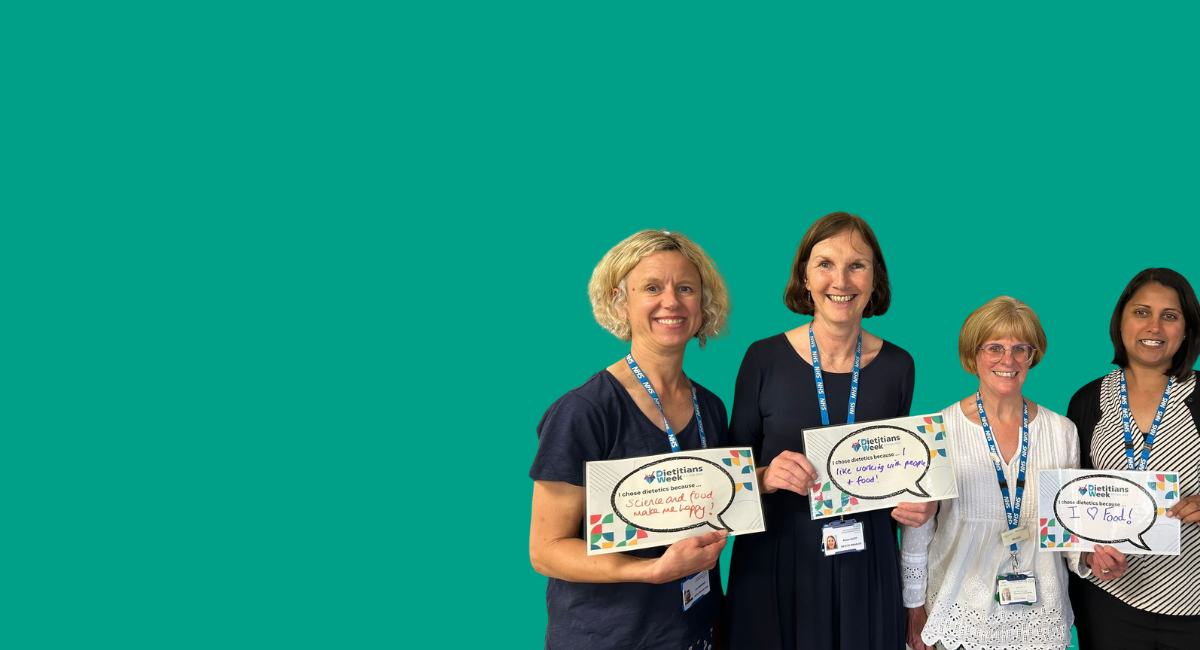 Dietetics team holding Dieticians Week signs