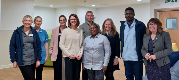 Marina ward staff and NHFT executives gathered in a group in the newly refurbished ward environment